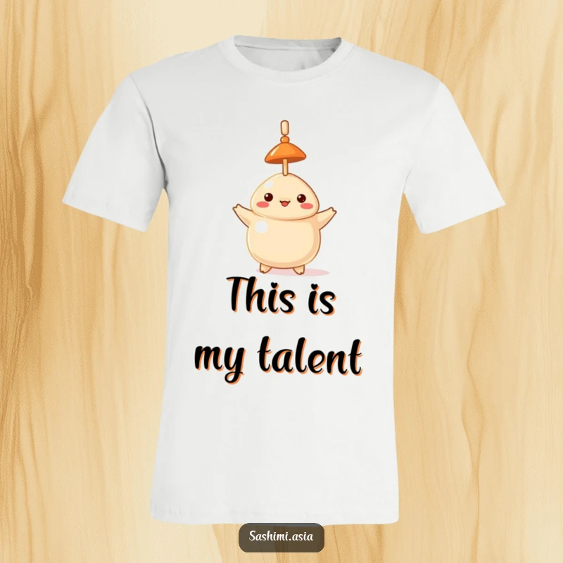 Funny t-shirt featuring a proud dumpling wearing a hat, skillfully balancing a toothpick on its head.